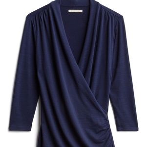 Dark blue crossfront ruched knit top